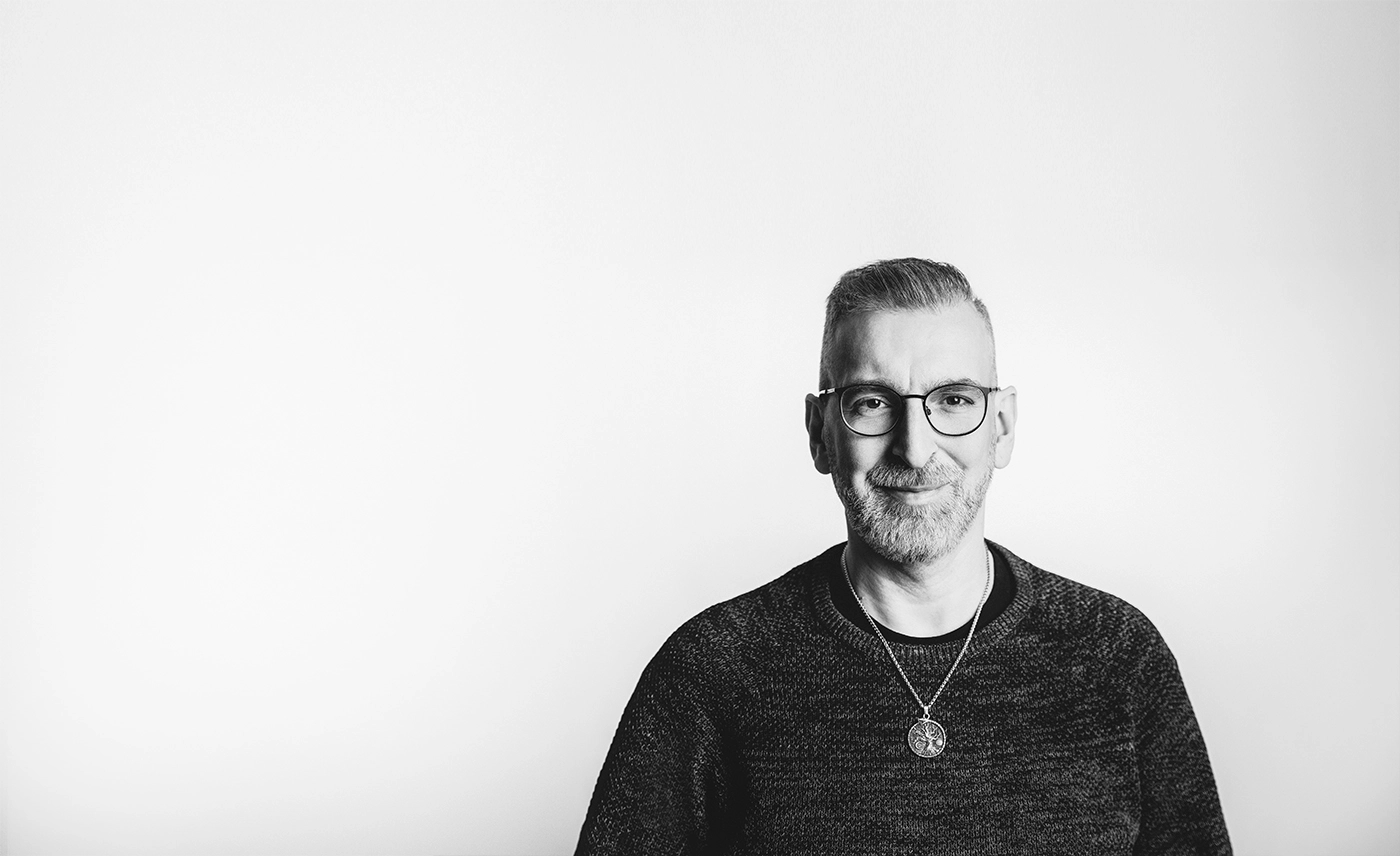 Michael Kißing, mit Brille und einem freundlichen Lächeln